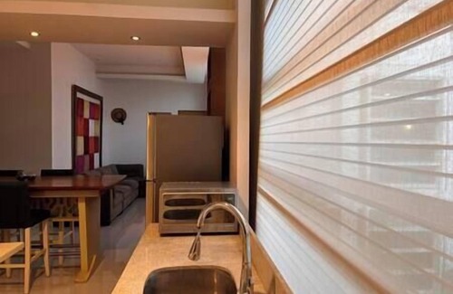Alfredo V. Bonfil Apartment | Velero Suites: Luxury and Comfort Near the Airport