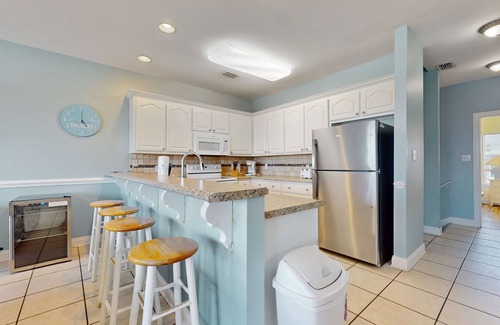 Southpointe House | Vibrant Gulf Front Duplex w/a Shared Pool & Free WiFi in a Great Location