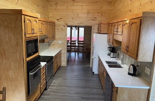 Sevierville Cabin | View Paradise of Bluff Mtn, Hot Tub, Firepit, Game Rm, Wi-Fi, 4BDR, 3BTR