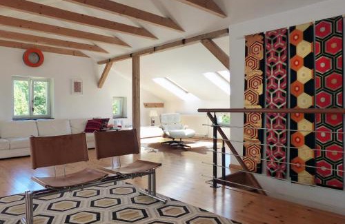 Warnitz Apartment | Villa am Trumpf - Design-Appartements im Naturgarten am See