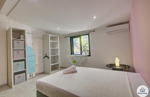 Sainte-Clotilde Villa | Villa Bambusa - 88m² - Piscine - 6 personnes - Proche centre-ville et aéroport
