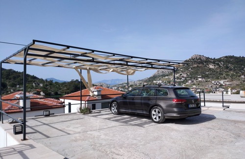 Avlana Villa | Villa Begonvilnözel havuzlu lüks villa,özel bahçe ve veranda , açık alanda masa,