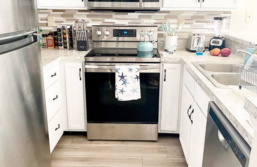 North Topsail Beach Condo | Villa Capriani 1BR Beachfront Escape-Pool, Hot Tubs & Resort-Style Amenities