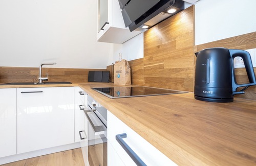 Timmendorfer Strand Apartment | Villa Dornkamp - a retreat under the roof. Sauna. Balcony. Stylish.