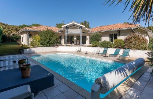 Biscarrosse Villa | Villa familiale avec piscine chauffée, clim, 4 chambres, proche golf et plages - FR-1-319-565