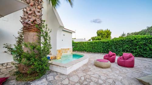 Rosa Marina Apartment | Villa Giglio with Garden and Mini Pool by Rentbeat