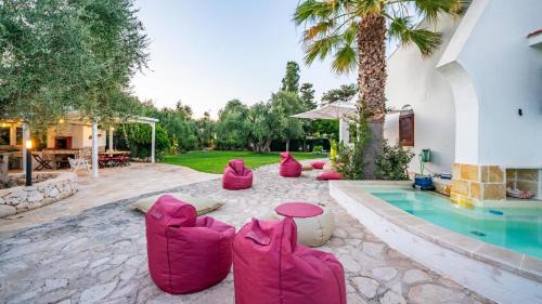 Rosa Marina Apartment | Villa Giglio with Garden and Mini Pool by Rentbeat