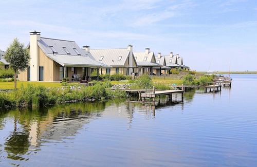 Tholen House | Villa in Netherlands with Waterfront Jetty