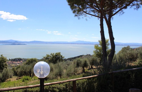 Passignano sul Trasimeno Villa | Villa with pool surrounded by nature with stunning views of Lake Trasimeno