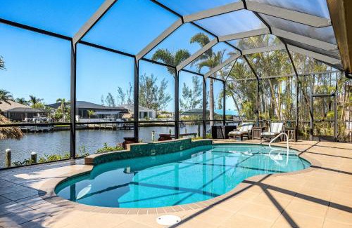Burnt Store House | Villa Neptune's Grotto- BRAND NEW with heated Pool, Hot Tub, and dock with Tiki