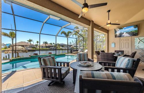 Burnt Store House | Villa Neptune's Grotto- BRAND NEW with heated Pool, Hot Tub, and dock with Tiki