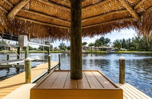 Burnt Store House | Villa Neptune's Grotto- BRAND NEW with heated Pool, Hot Tub, and dock with Tiki