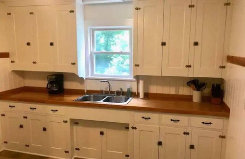Gowanda House | Village Retreat, with four bedrooms and large yard