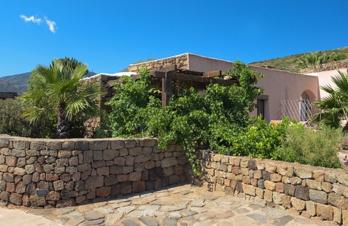 Pantelleria House | [Vineyard View + Garden + Barbecue] "Lemon Yellow Dammuso"