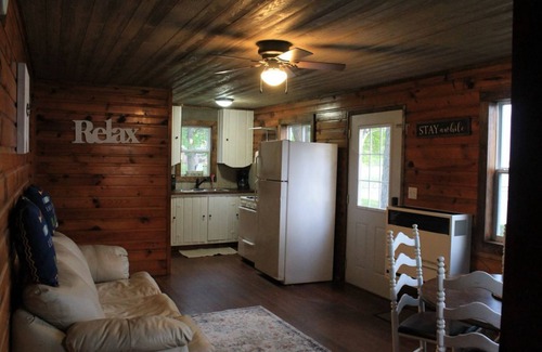 Siren Cabin | Vintage-style lakeshore cabin - right on Clam Lake with dock, flat lake walkout