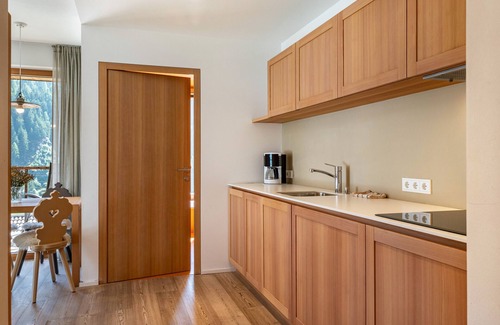 Santa Cristina Val Gardena Apartment | Vista Dolomites Apartment "Harmony" with Mountain View, Private Garden & Wi-Fi