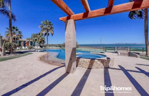 El Centenario Apartment | Vista Dorada 1BR condo Great view of Bay & Sea w pool