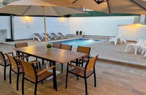 Aios House | Vivienda adosada con piscina cerca de la playa