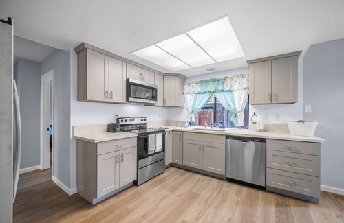 Rancho del Rey House | VRBO: River Ash Retreat-4BD Getaway w/Arcade & Backyard