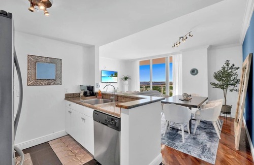 Coconut Grove Apartment | Wake by the Waves. Drift into Calm. Large Balcony