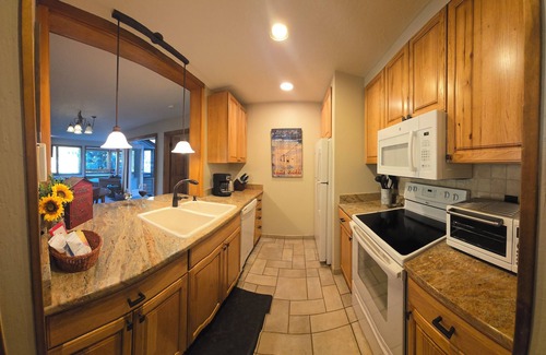 Lakeside Village Condo | Wake up next to the peaceful waters of Keystone Lake 2BR/2BA Private Patio.