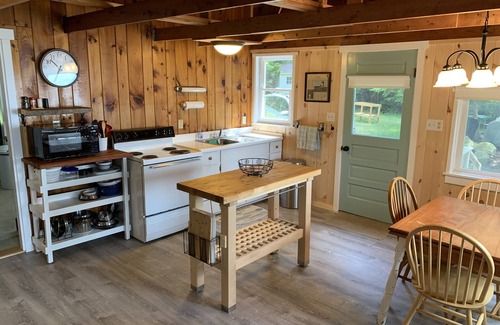 Winthrop Cabin | Walk out beach in private cove on Cobboossee Lake