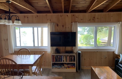 Winthrop Cabin | Walk out beach in private cove on Cobboossee Lake