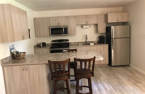 Whitefish Apartment | Walk out into the woods from this studio apartment located close to state lands.