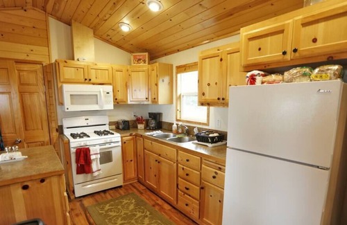 Sekiu Apartment | Walk out the front door, across a grass lawn and onto a sandy beach