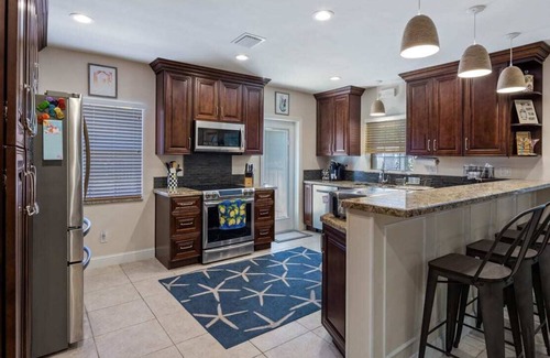 Midtown House | Walk to Higgs Beach Hideaway- Heated Amazing Pool!