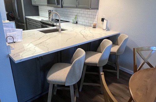 Sunset Reef Condo | Walk to restaurants on Redington Shores beach with wraparound porch.