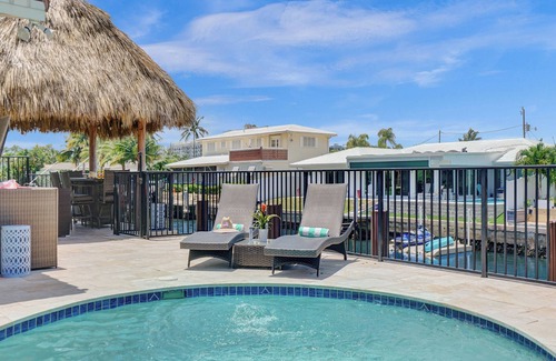 Bel Air House | Walk to the beach! Tiki Hut, Waterfront, Heated Pool, kayaks, bicycles, arcade!