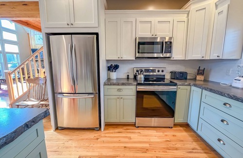 McHenry House | Walk to Wisp! Stunning Lakefront Home!