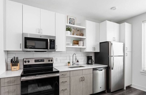 Cole-Noble District Apartment | Walkable Studio Apartment in Downtown | CozySuites
