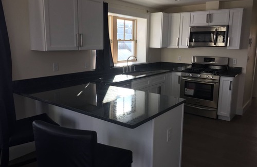 Oak Bluffs Apartment | Walking Distance From Oak Bluffs Ferry Terminal With 180 Degree Ocean View.