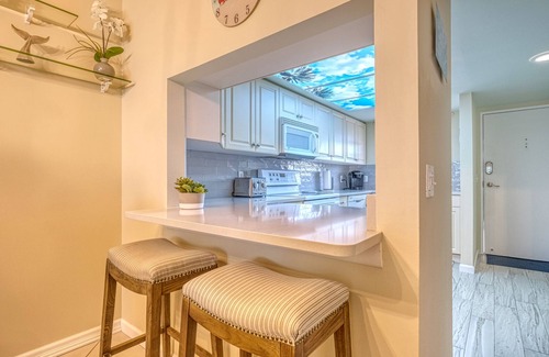 Indian Shores Condo | Watch the Boats Go By and Dolphins Play!
