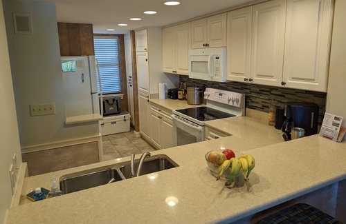 Shelter Cove Condo | Water front top floor condo - no car required for fun!