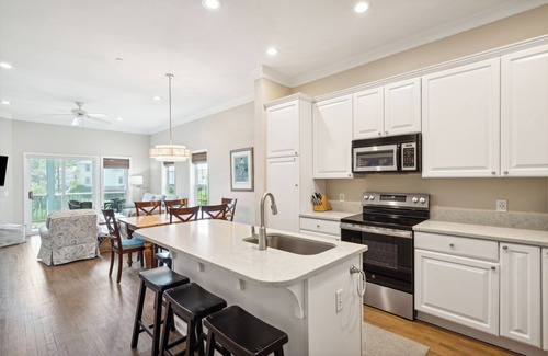 Waters Edge House | Water's Edge 83 - Comfy Cool - Pool - River Views - Close to Everything - Beautifully Updated