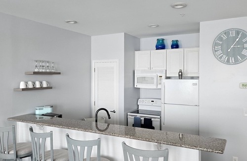 Southport Condo | Water view condo overlooking Marina, with private deck