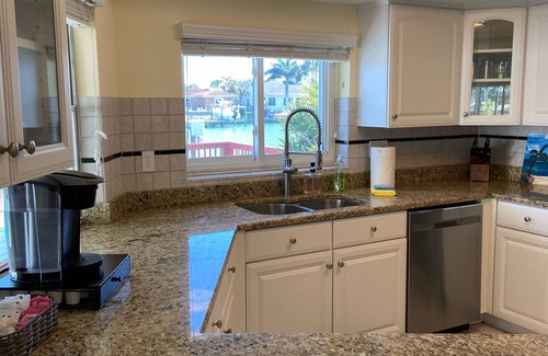 Island Estate House | Water View home with private pool and heated spa with boat deck clearwater