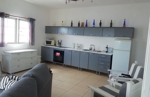 Punta Mujeres Apartment | Waterfront Apartment with roof Terrace. Children free in summer.