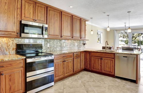 Jupiter House | Waterfront 4bedroom home with boat lift and additional 40' slip at extra cost