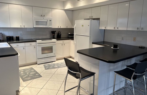 Barrier Island Apartment | Waterfront-4BR+3B Intercoastal,Pool,Dock,Beach,parking