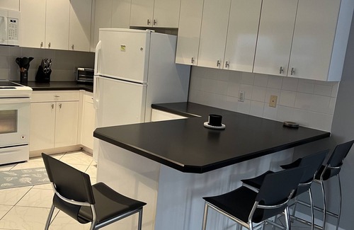 Barrier Island Apartment | Waterfront-4BR+3B Intercoastal,Pool,Dock,Beach,parking
