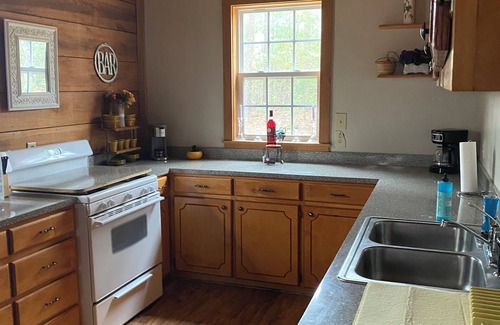 Lumberton Cabin | Waterfront Cabin off I-95 in Lumberton with WiFi, Foosball, Kayaks, Pet-friendly