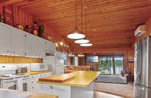 Hayden Lake House | Waterfront Cabin—Private Dock with Boat Slip, Paddle Board for Fun on the Water!