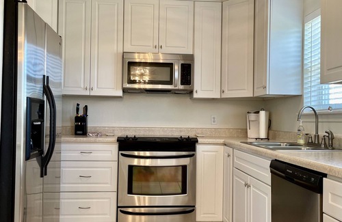 Shoreline Park House | Waterfront Camp in Jourdan River Estates