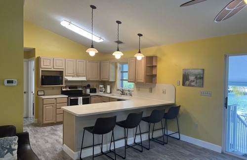 Key Colony Beach House | Waterfront Canal Priv Home. 3BD, 2BA, Pool, Kayak+Cabana Club! 70' Seawall-KCB