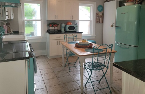 Colonial Beach House | Waterfront Coastal Farmhouse, Private Pier, Fire Pit with Separate Bunk House