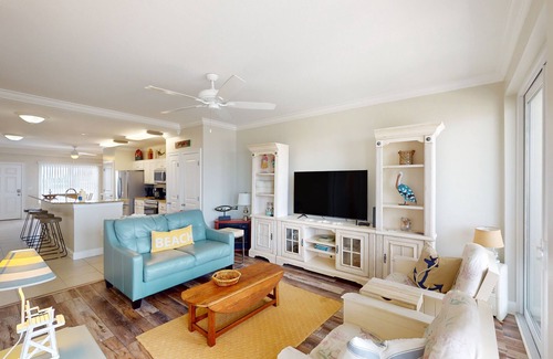 Mexico Beach Condo | Waterfront condo with pool, hot tub, furnished lanai, fireplace & chic furniture